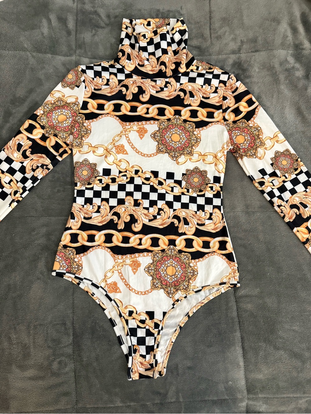 Long-Sleeve One-Piece Bodysuit in Black, White & Gold Print